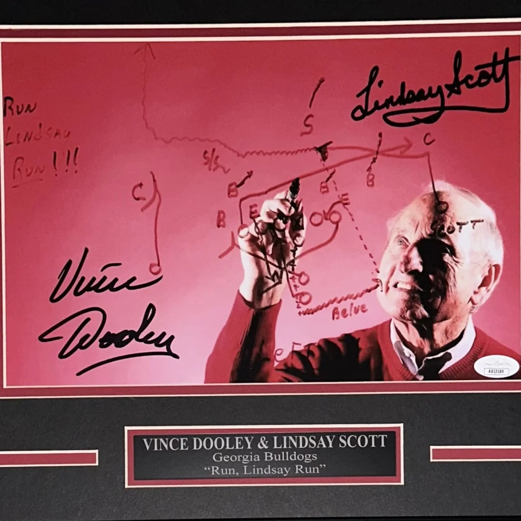 Framed 8x12 photo of signed Vince Dooley and Lindsay Scott with Run Lindsay Run play