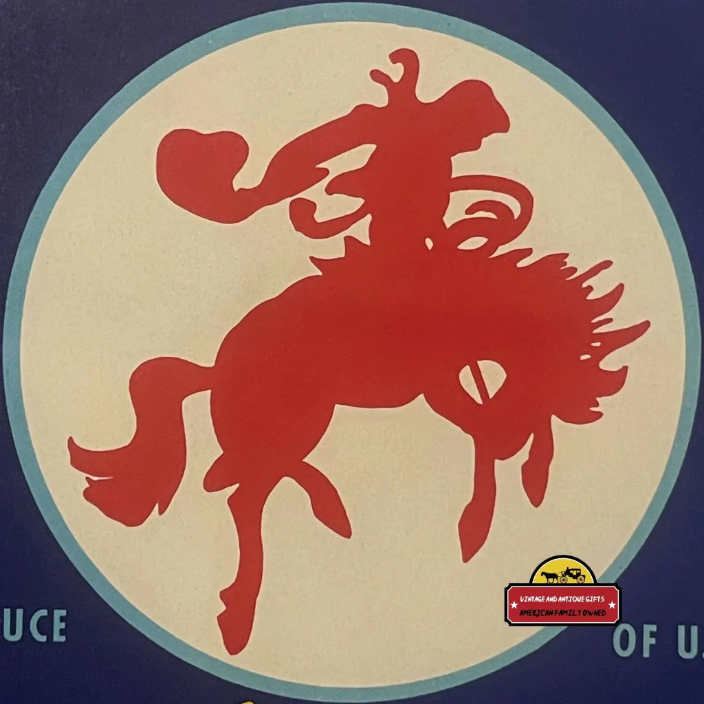 Red silhouette of cowboy on bucking horse for 1940s Challenger Crate label