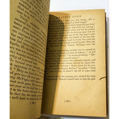 Open aged prairie guns book showcasing Western Americana classic vintage 1945 paperback