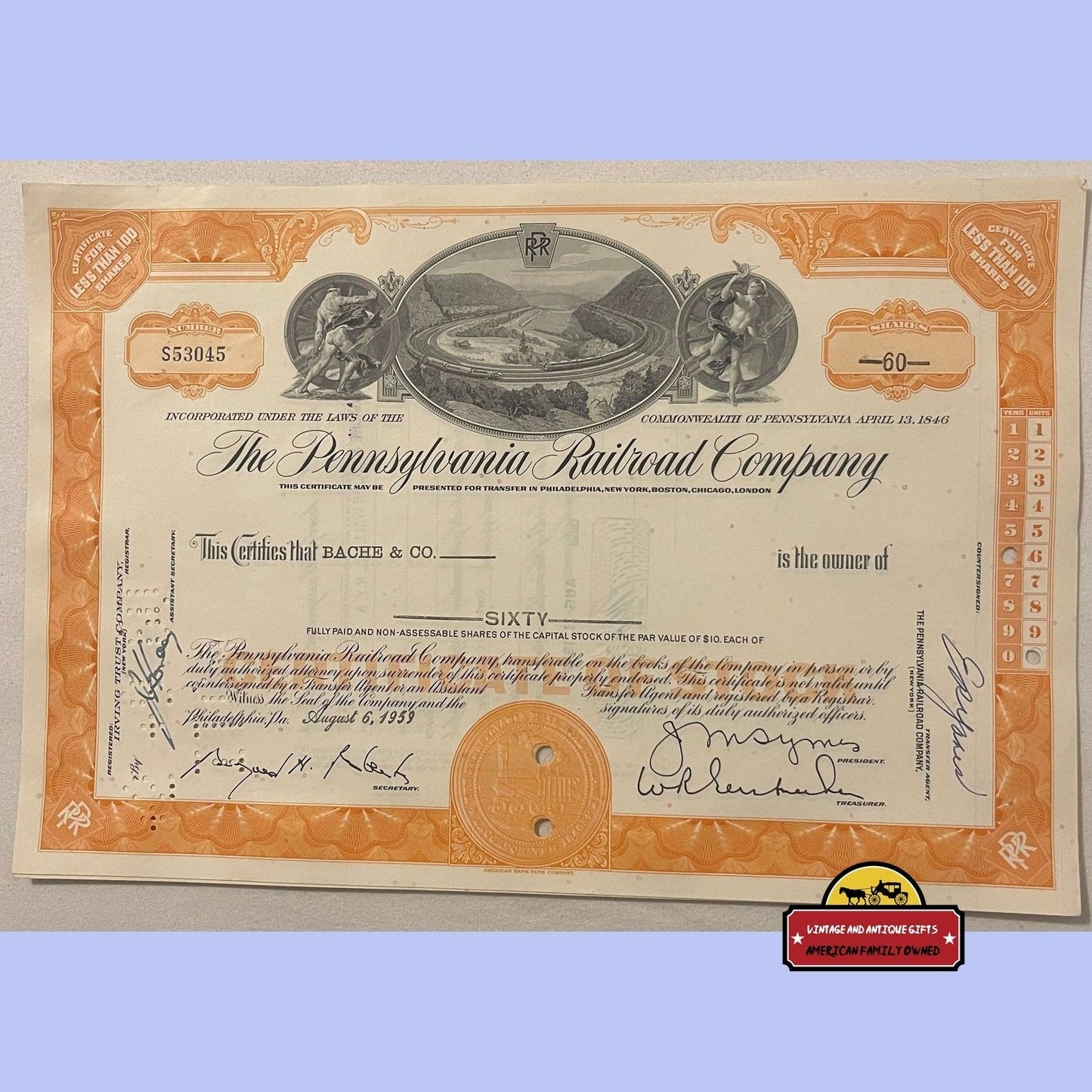 Antique vintage Pennsylvania Railroad stock certificate with ornate orange border