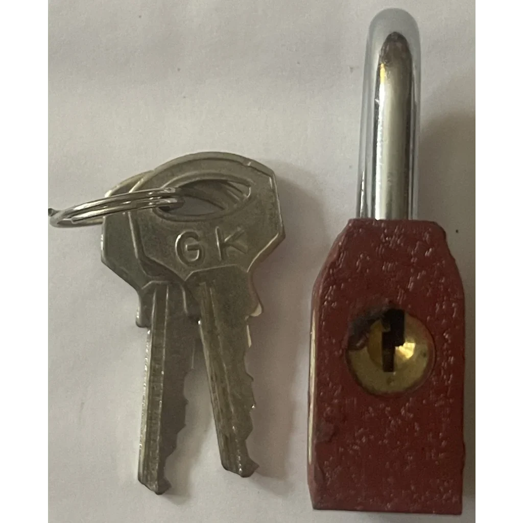 Vintage 1950s GoldKey Iron Padlock with silver keys and a metallic shackle