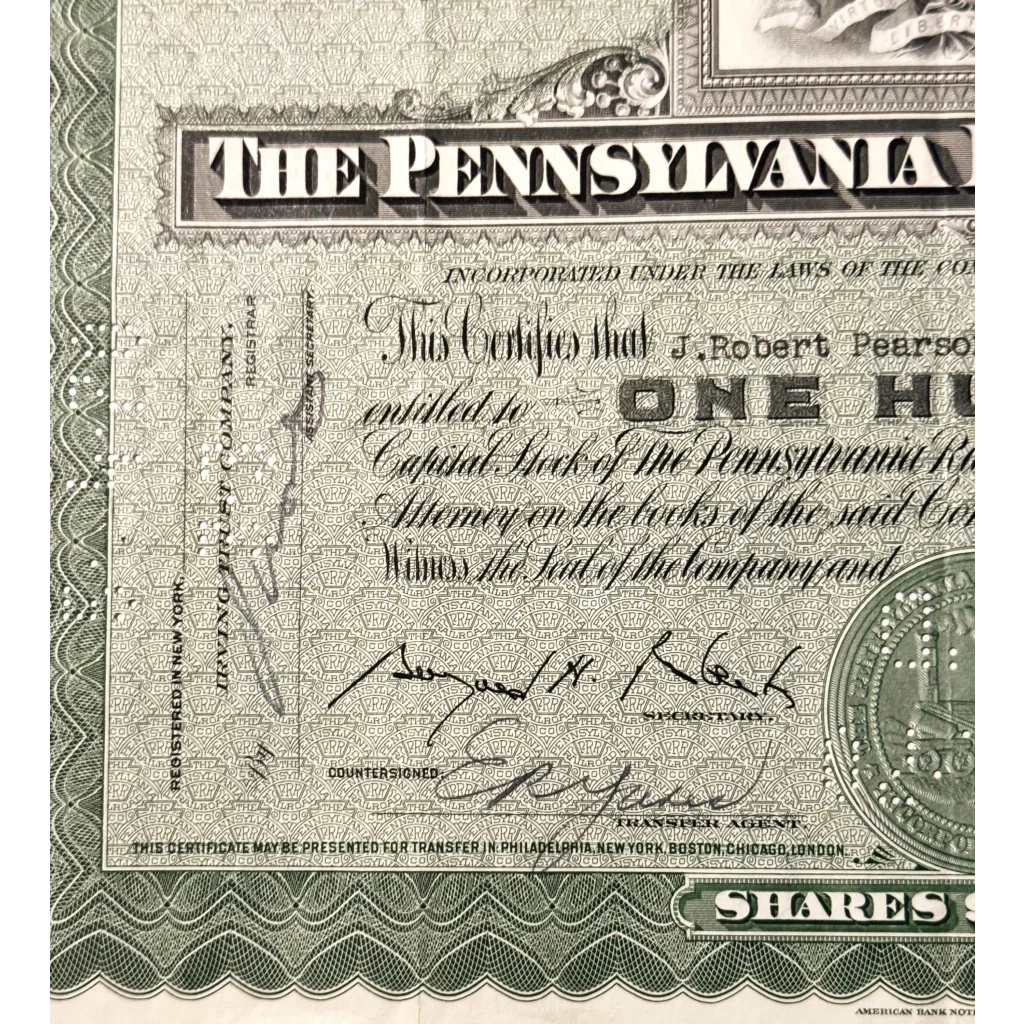 Vintage Pennsylvania Railroad stock certificate from the 1950s, elegant green design