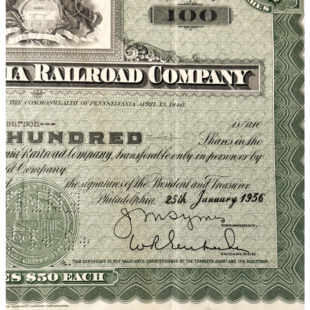 Vintage Pennsylvania Railroad stock certificate from January 1956 in green design