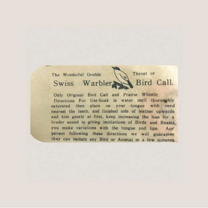 Vintage 1950s Swiss Warbler bird call instructions with double throat design