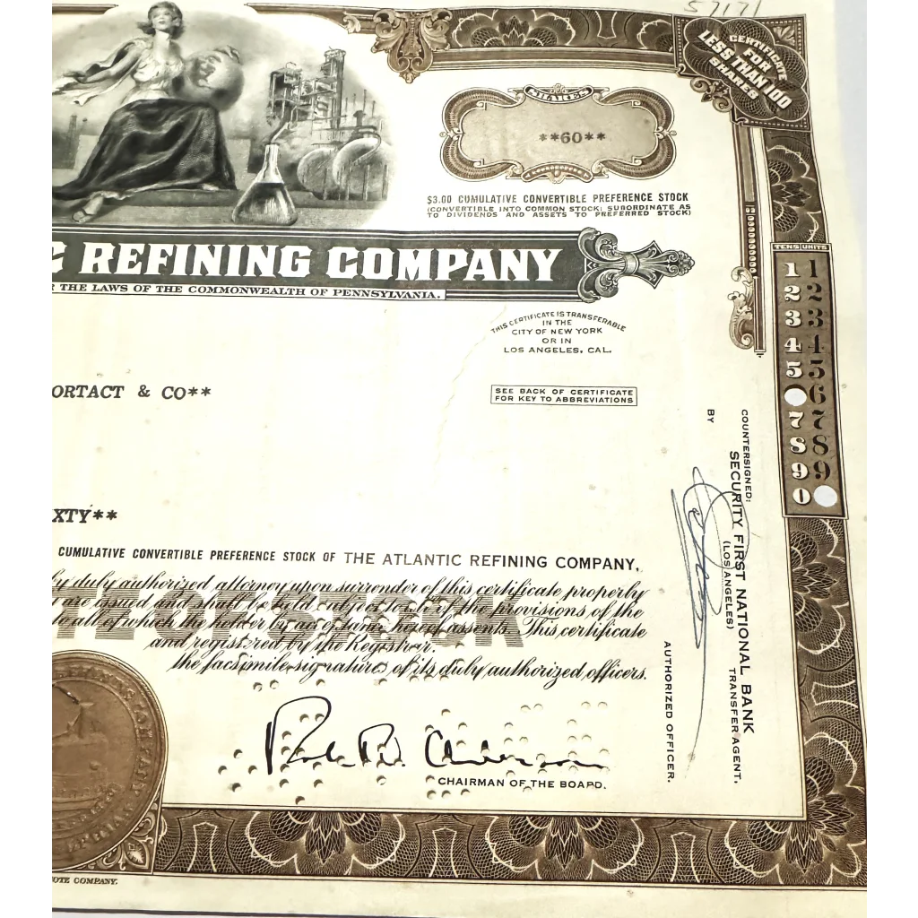 Ornate Atlantic Refining Company stock certificate showcasing unique border designs