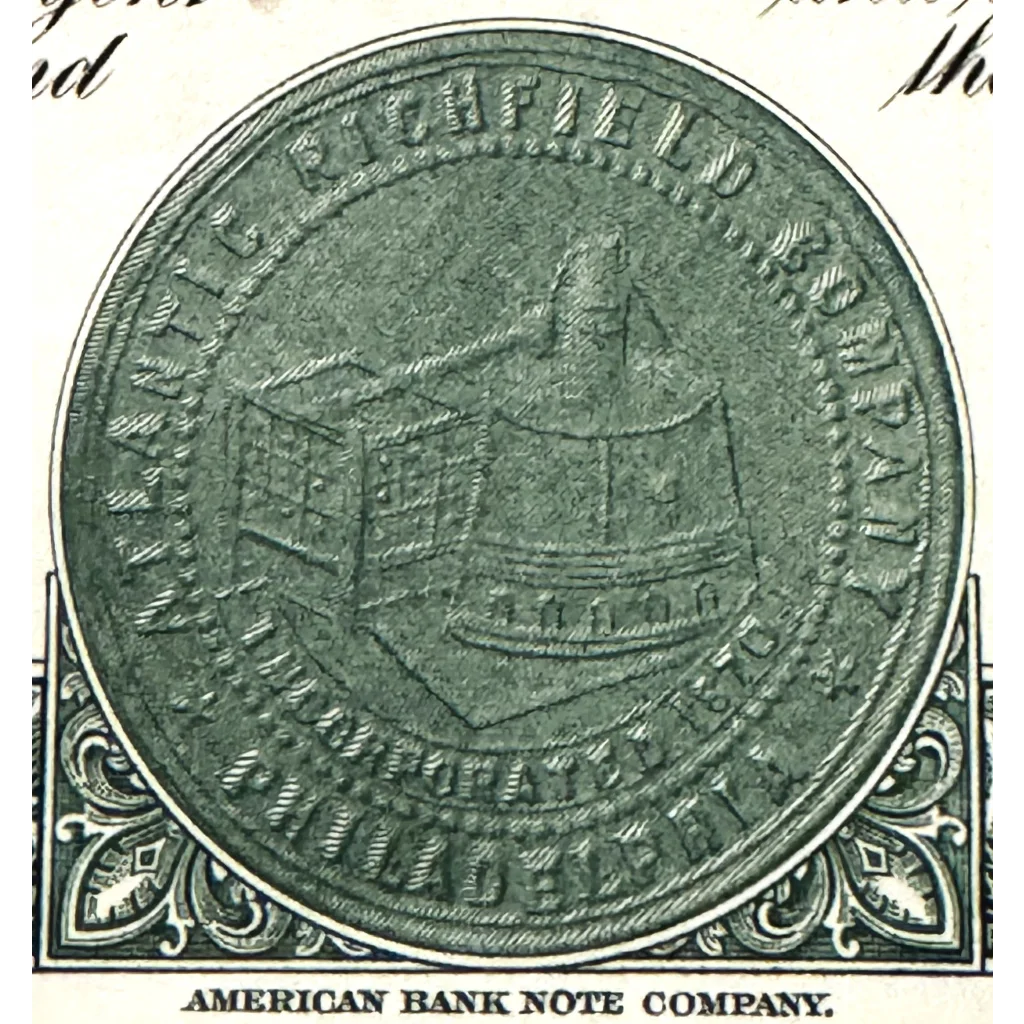 Circular seal of Atlantic Richfield Stock Certificate featuring a tent-like design