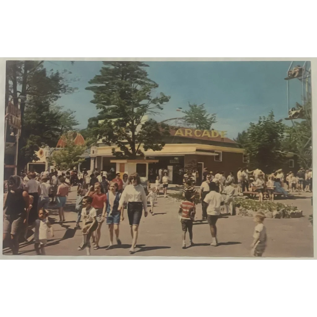 Vintage postcard of a crowded Canobie Lake Park arcade with happy visitors wandering around