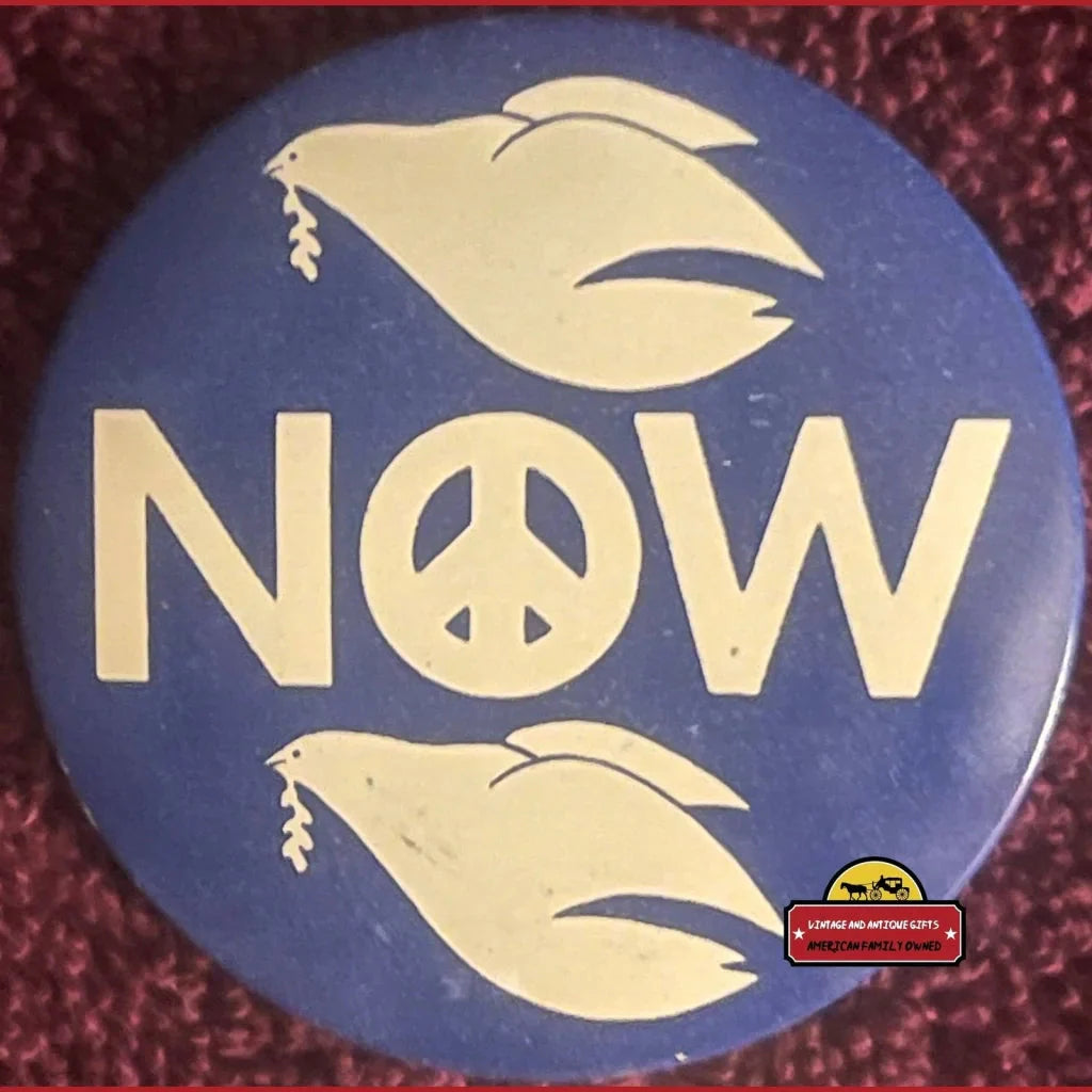 Blue button with NOW text and peace symbol on a Rare 1960s Vietnam War Peace Dove Pin