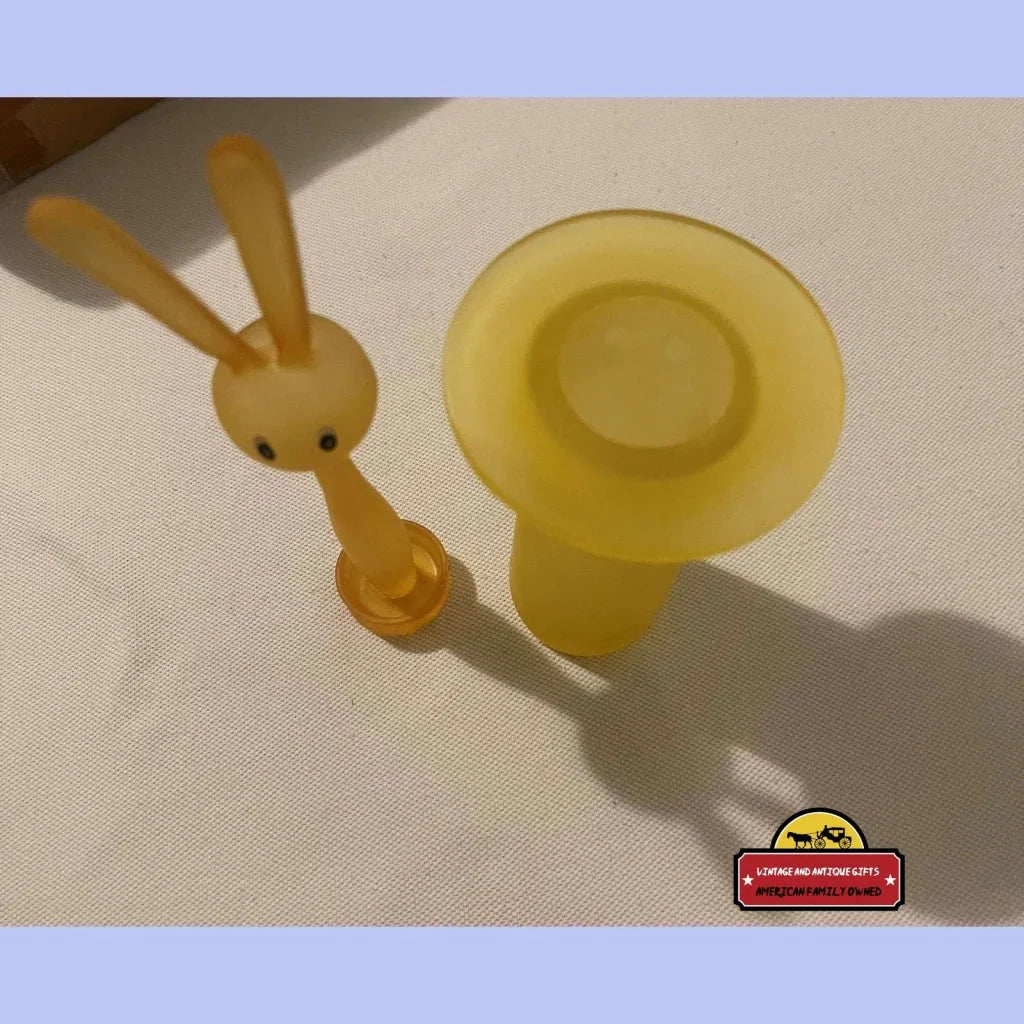 Yellow plastic rabbit-shaped honey dipper in Retro Bunny Rabbit Toothpick Holder design