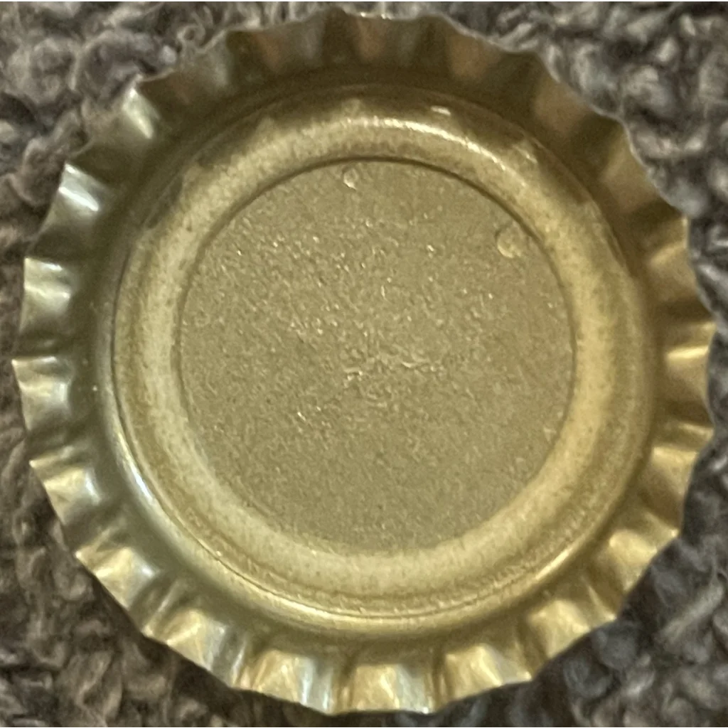 Metallic soda bottle cap from Rare 1970s Caravan Strawberry Soda with Egyptian Pyramid design