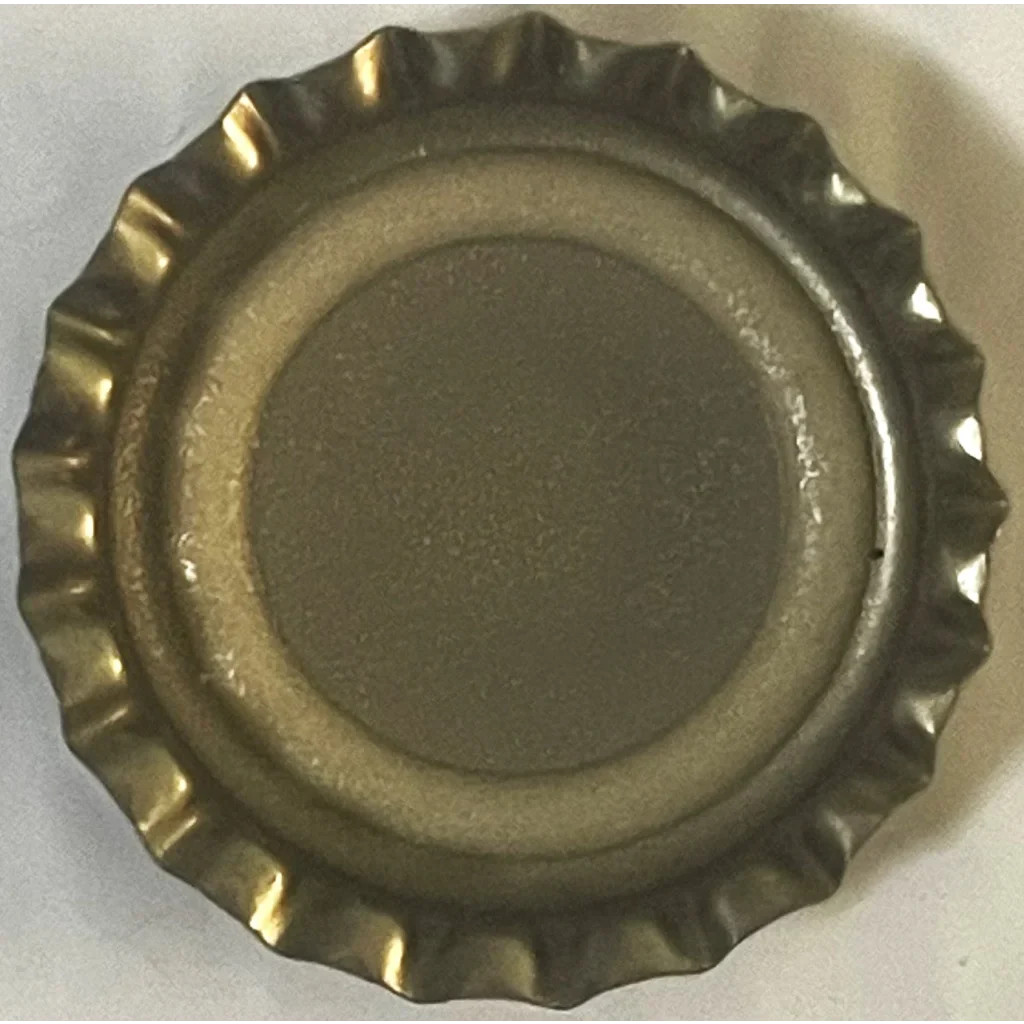 Metal bottle cap with ridged edge from a Rare 1970s Big B Grape Soda collectible