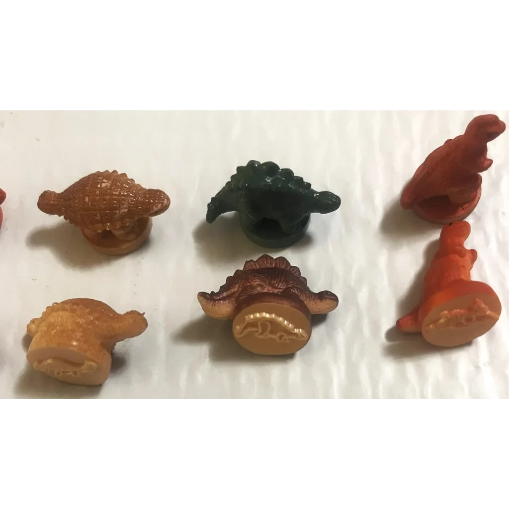 Colorful dinosaur rubber figurines showcasing Rare Vintage 1970s dinosaur rubber stamps