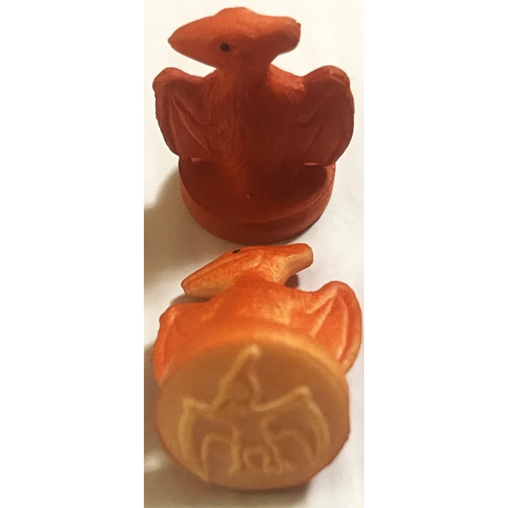 Red ceramic bird figurine with wings spread, perfect for vintage dinosaur rubber stamps