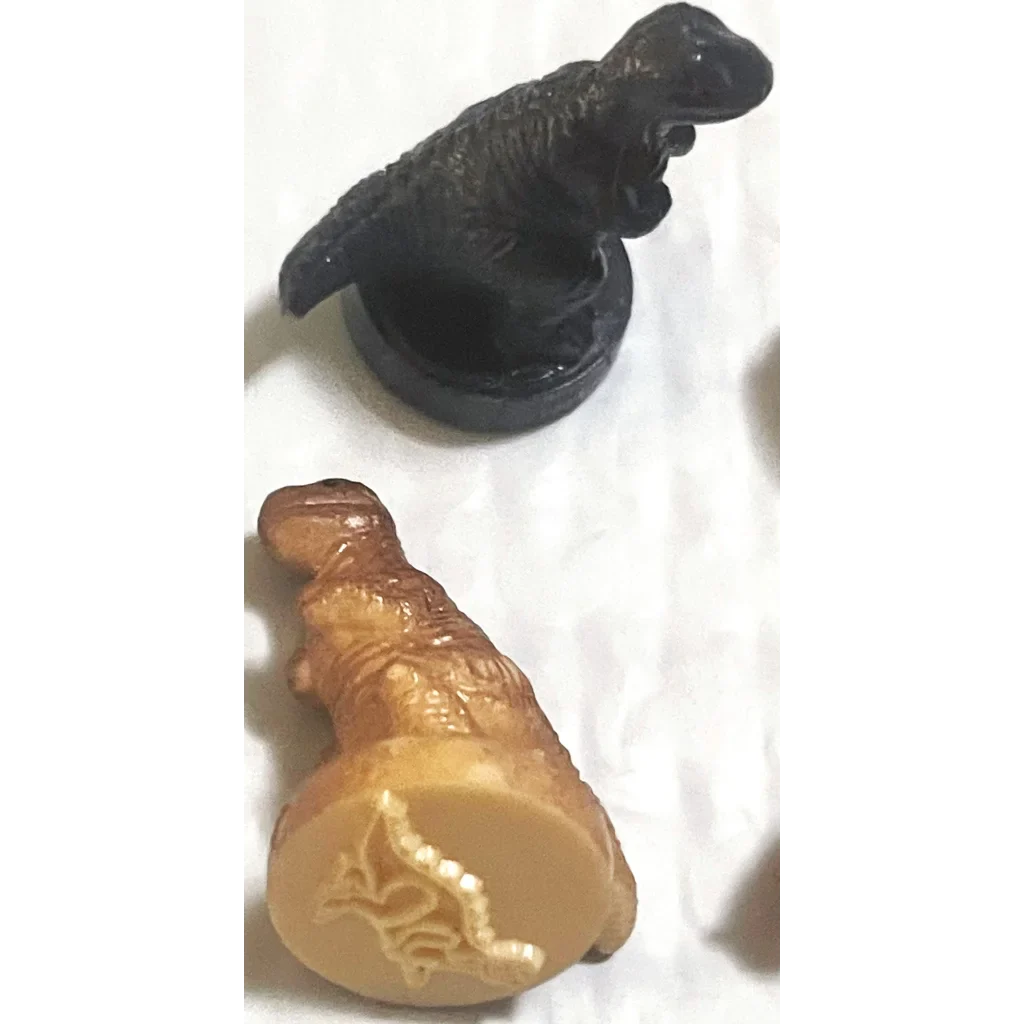 Plastic toy dinosaur figurine in dark color for Rare Vintage Dinosaur Rubber Stamps