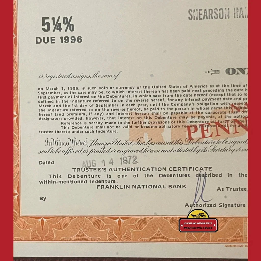 Vintage 1996 financial certificate with red SPECIMEN stamp, showcasing Pennzoil stock