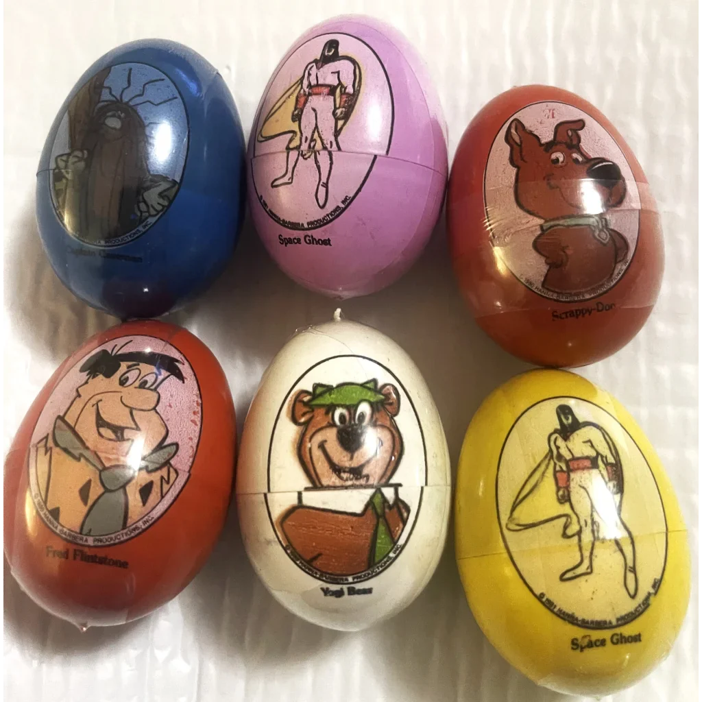 Colorful Hanna Barbera plastic eggs with fun character designs, 80s collectible sealed