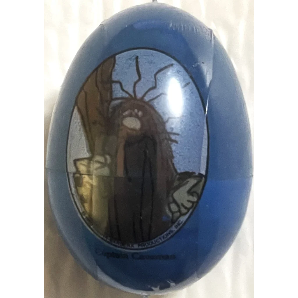 Blue Hanna Barbera plastic egg with a cartoon character window for 80s collectors