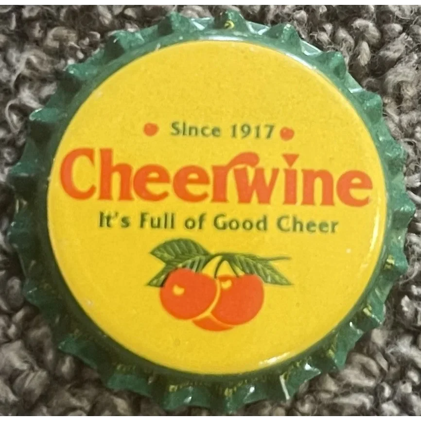 Rare 1980s Cheerwine bottle cap with yellow background and cherry design