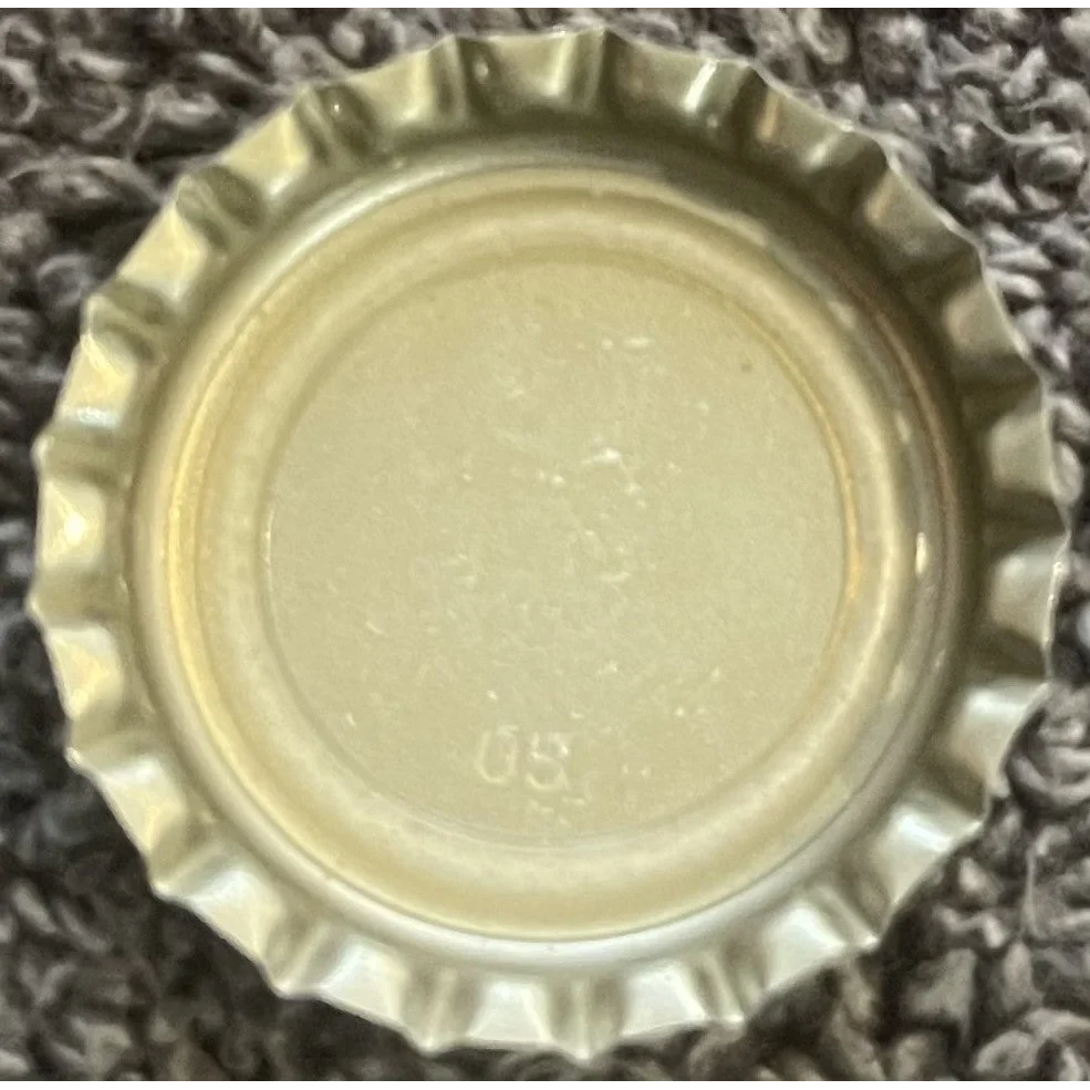 Bottle cap with ridged edge, showcasing the rare 1980s Cheerwine vintage design