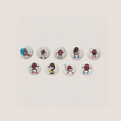 Vintage 1980s complete California Raisins tin pins featuring character buttons for collectors