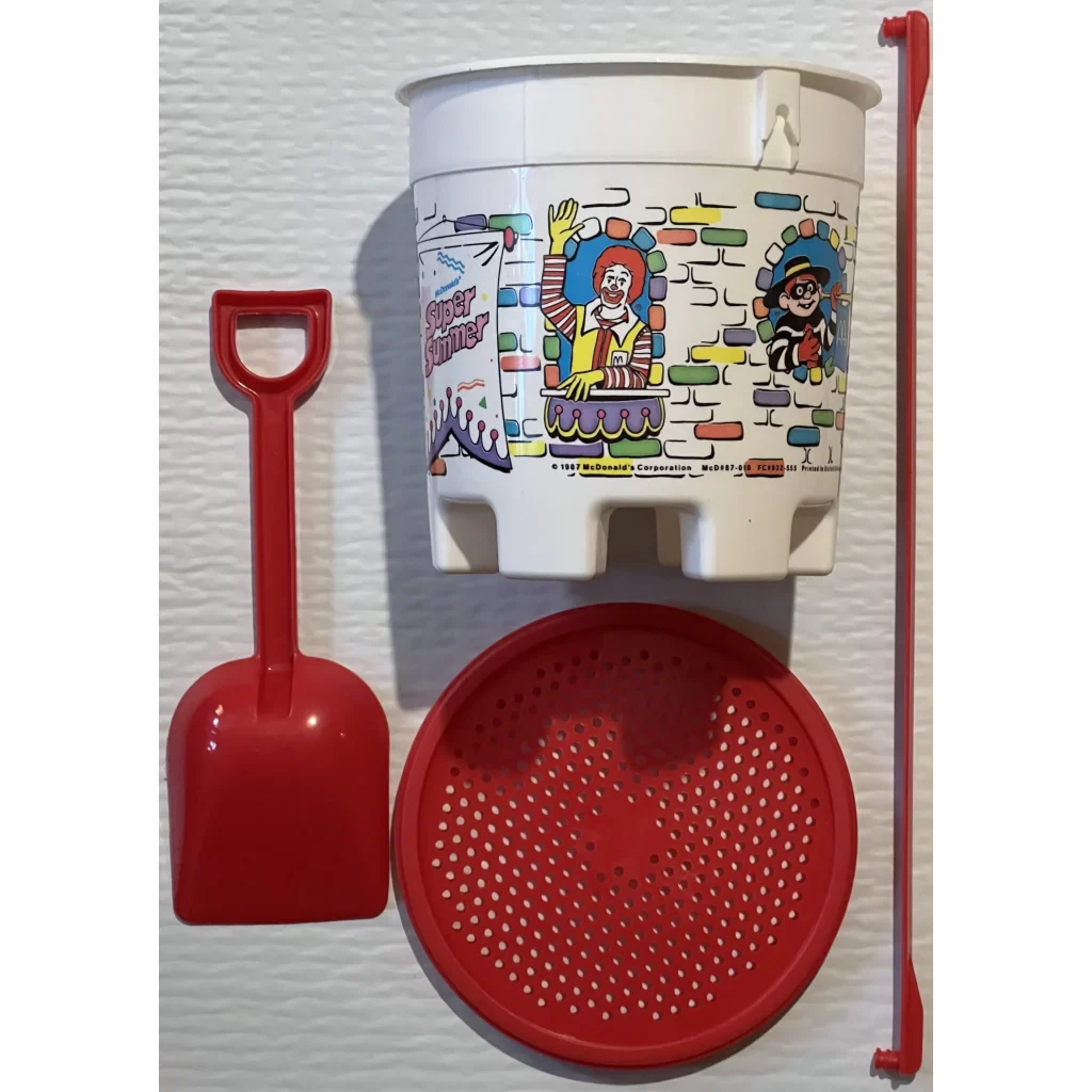 White plastic bucket with fun cartoon characters for the Retro McDonald’s Super Summer Sandcastle