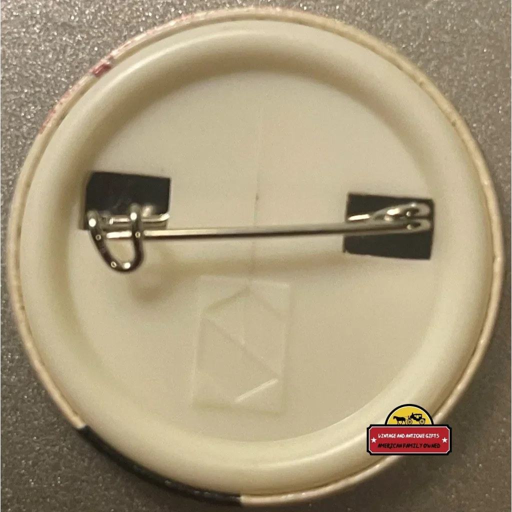 Safety pin on a circular white lid from a Donnie Wahlberg Vintage Collectible