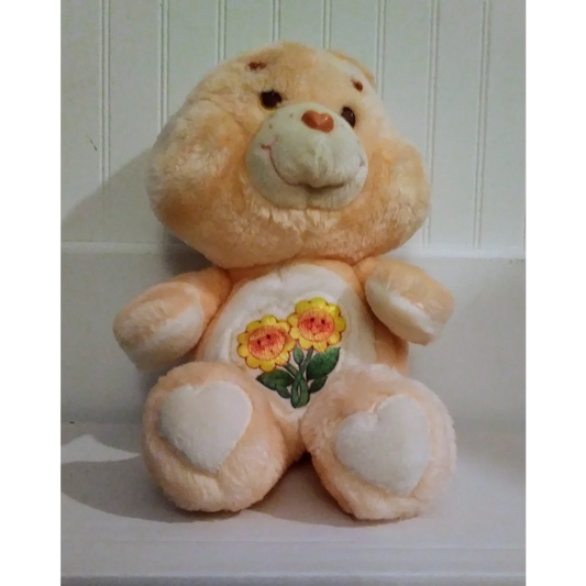 Vintage 1983 Friend Bear Care Bears plush with peach fur and heart