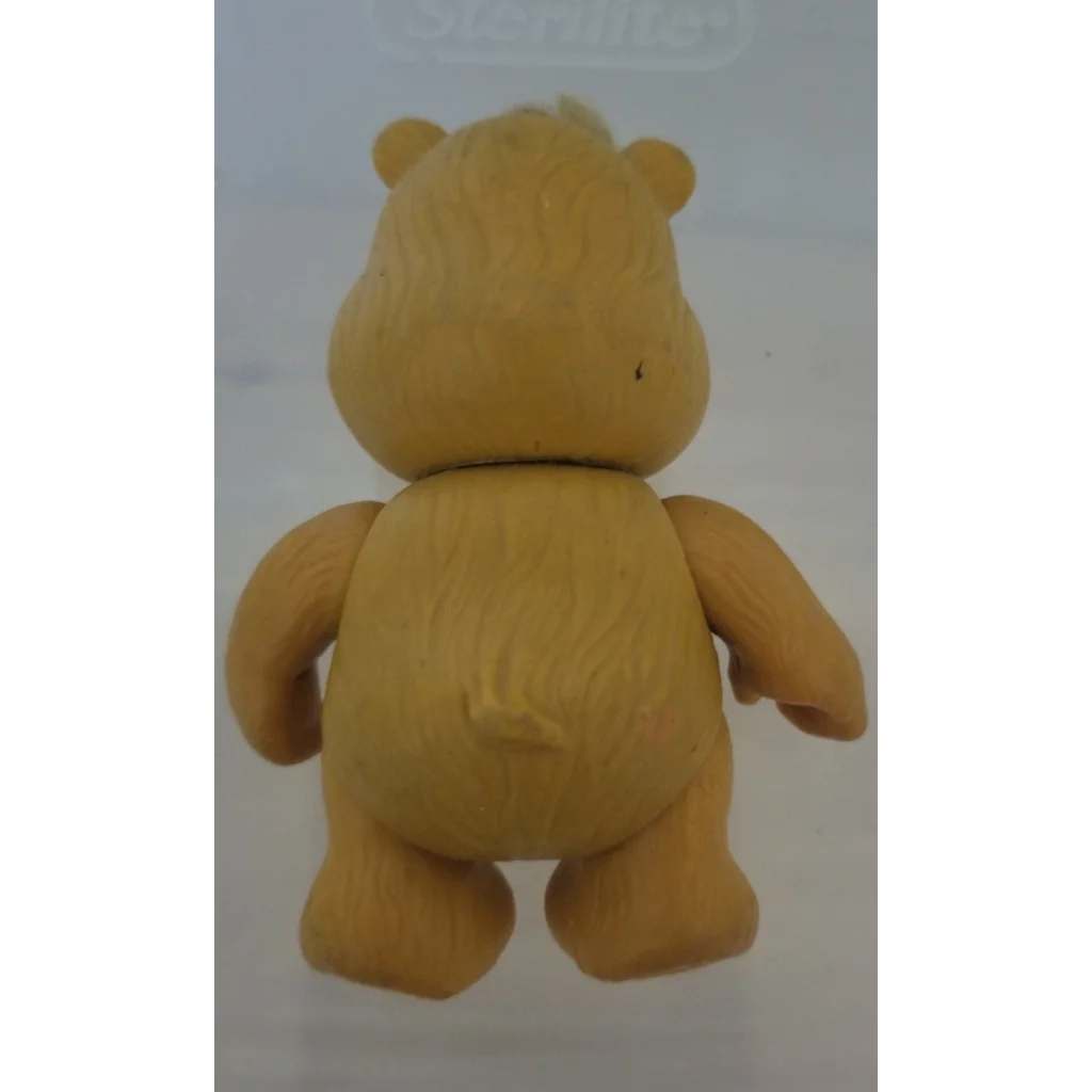 Vintage 1983 Tenderheart Bear PVC figure, yellow Care Bears collectible
