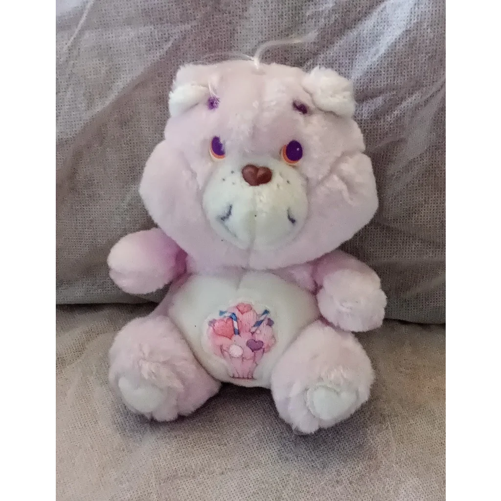 Vintage 1984 Care Bears Share Bear pink plush with purple eyes