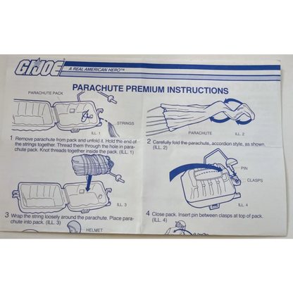 Vintage 1984 GI Joe parachute pack with gas mask, helmets, and premium instructions manual