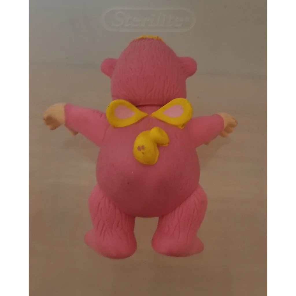 Vintage 1985 Wuzzles Rhinokey pink PVC figure with yellow goggles and duck beak