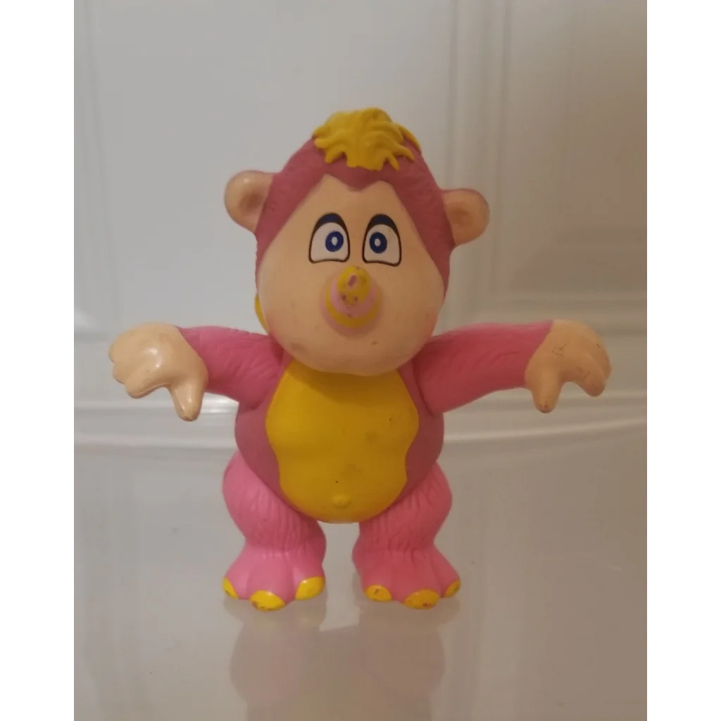 Vintage 1985 Wuzzles Rhinokey pink yellow PVC figure toy with banana belly