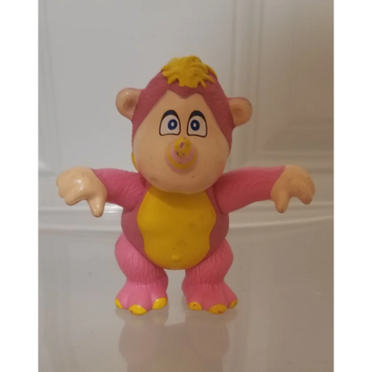Vintage 1985 Wuzzles Rhinokey pink yellow PVC figure toy with banana belly