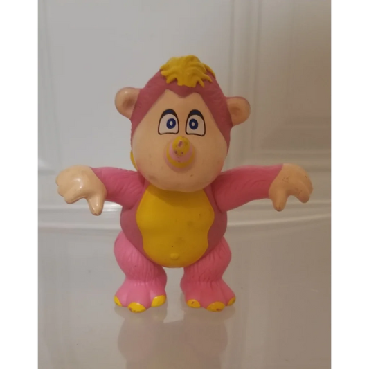 Vintage 1985 Wuzzles Rhinokey pink yellow PVC figure toy with banana belly