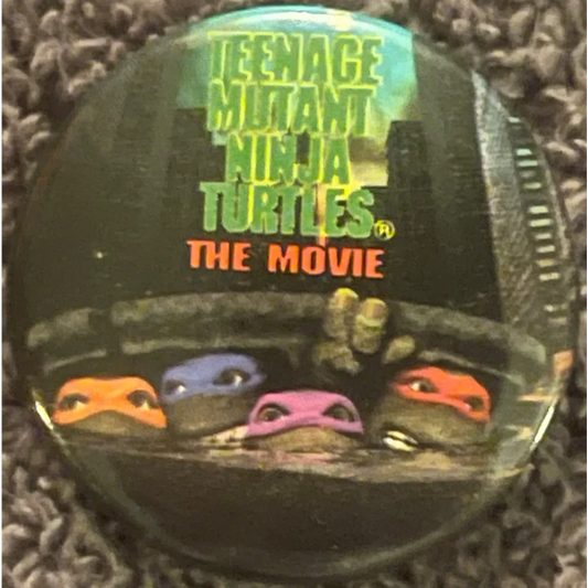 Vintage Teenage Mutant Ninja Turtles Movie Pin with iconic characters’ eyes design