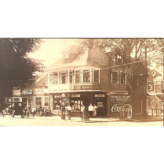 Vintage storefront with Coca-Cola ads and people outside, perfect for the Coke Coca Cola postcard set