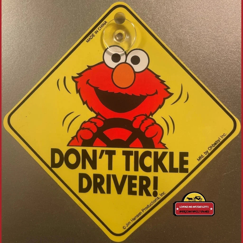 Vintage Sesame Street Elmo window sign with funny Don’t Tickle Driver message