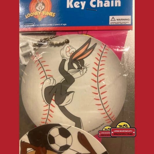 Baseball-shaped keychain of Bugs Bunny from Looney Tunes, perfect for fans!