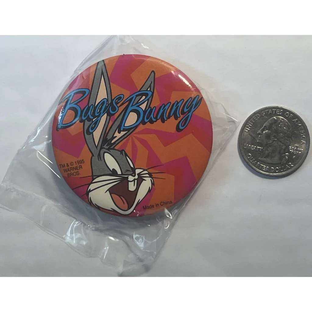 Colorful Looney Tunes pin with Bugs Bunny on bright orange, perfect for 90s fans