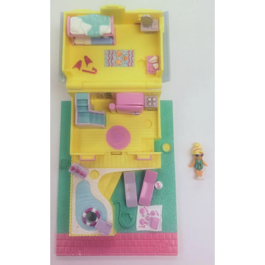 Vintage 1993 Polly Pocket summer beach house playset in yellow and pink with plastic accessories