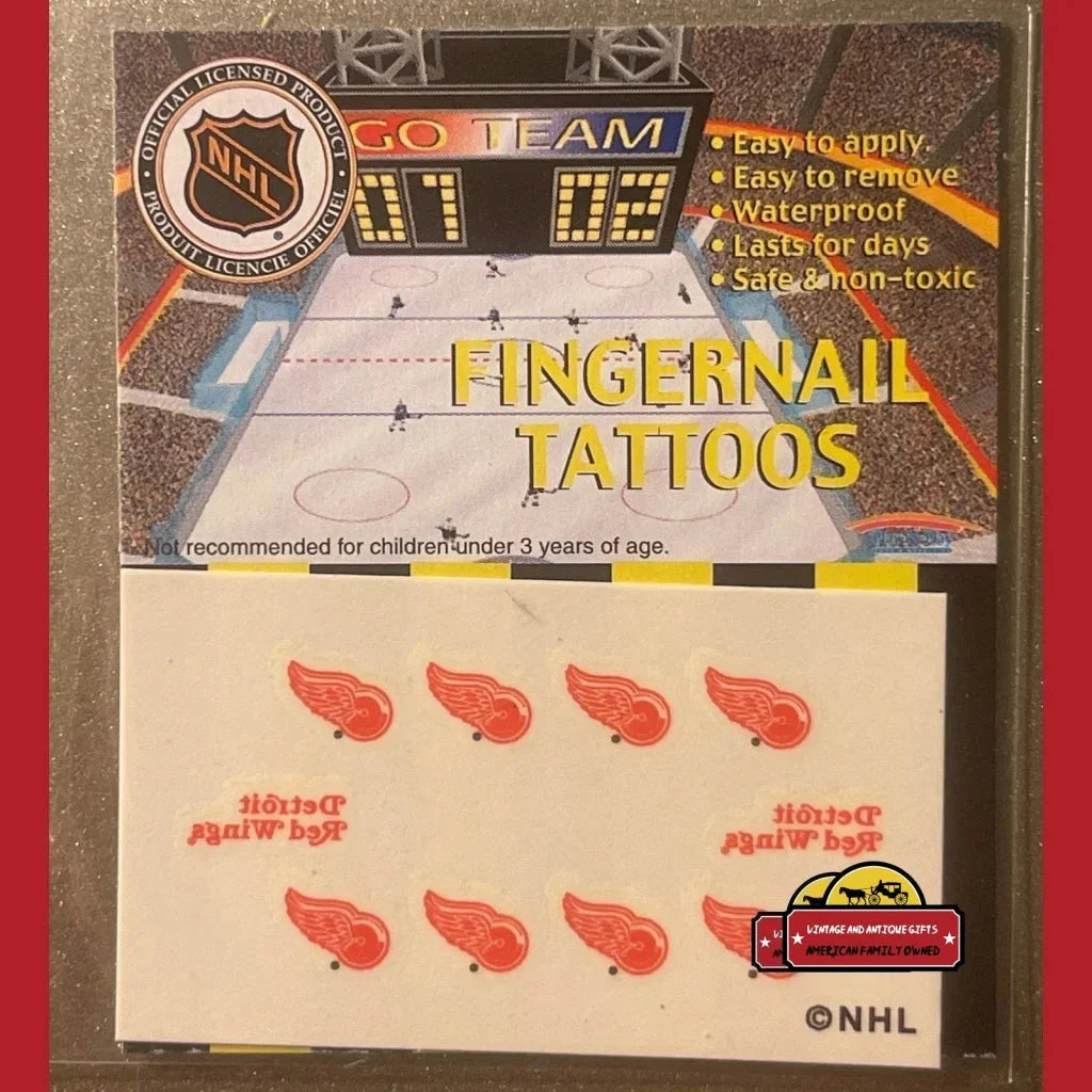 Fingernail tattoos featuring Detroit Red Wings logo for NHL fans