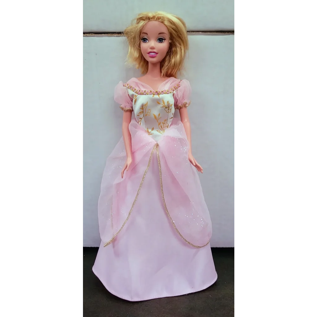 Vintage 1999 Princess Barbie doll in pink ball gown with blonde hair