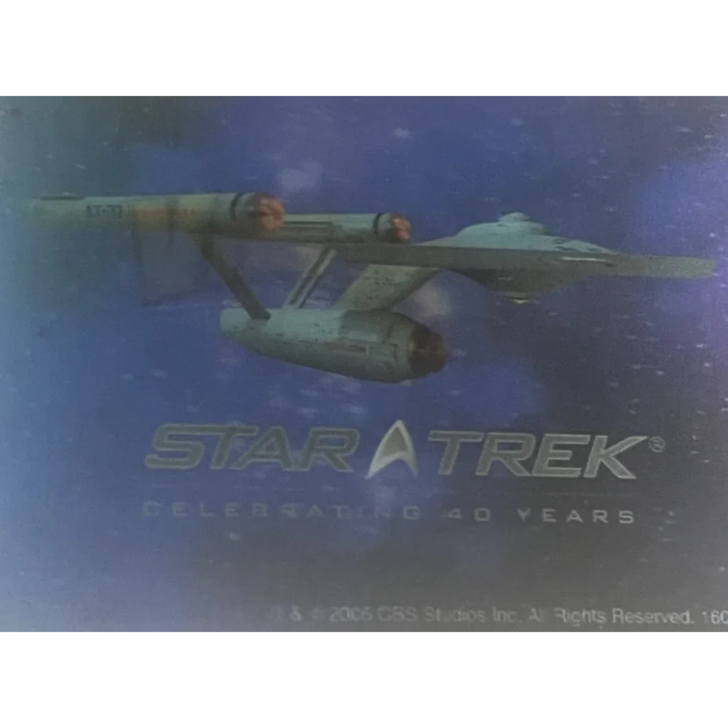 Rare Star Trek Enterprise Hologram collectible soaring through space in vintage style