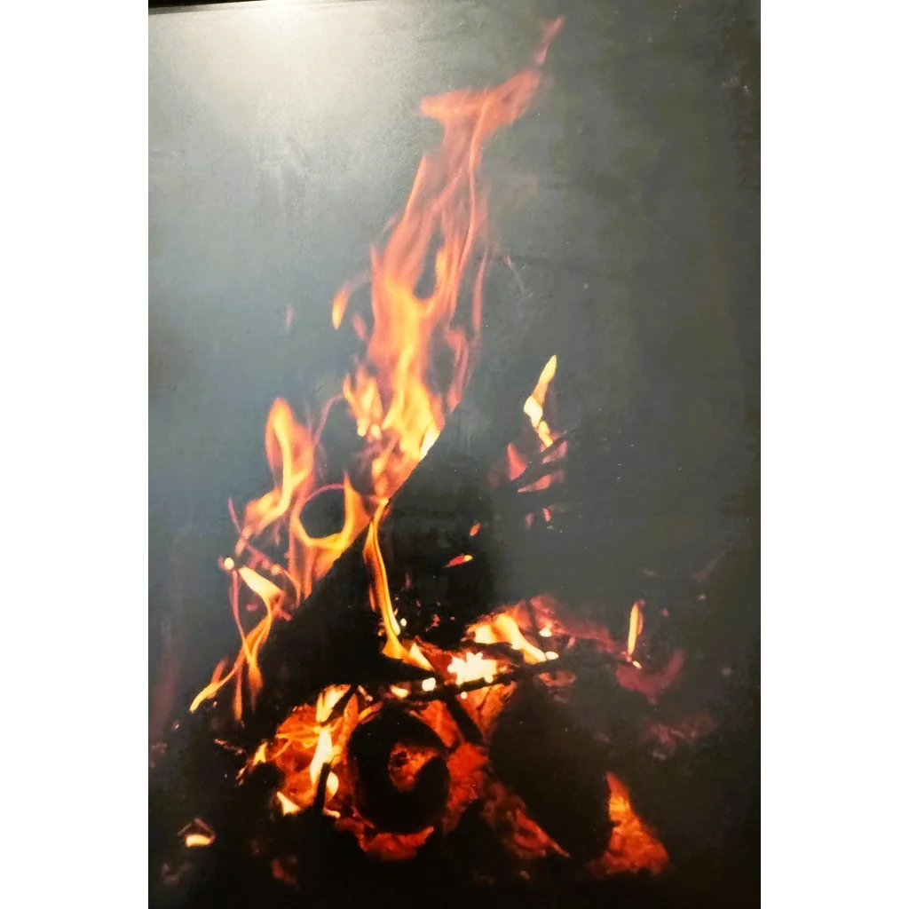 Vintage American Hoechst contest entry bonfire with glowing embers, 50mm lens