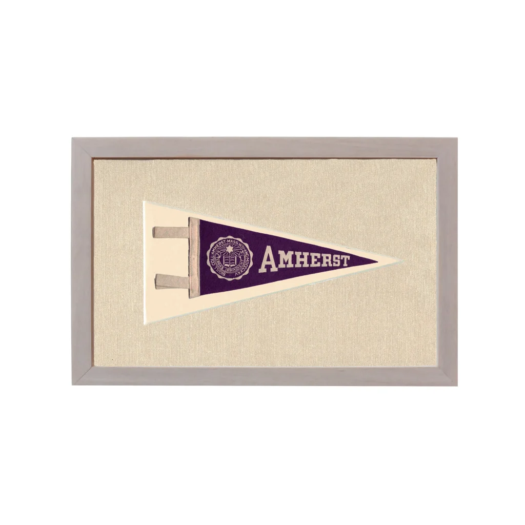 Vintage Amherst College pennant in frame with purple field and crest