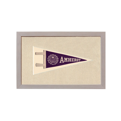 Vintage Amherst College pennant in frame with purple field and crest