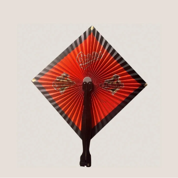 Vintage Baltimore Orioles MLB folding fan from the 1990s with red pleated square design