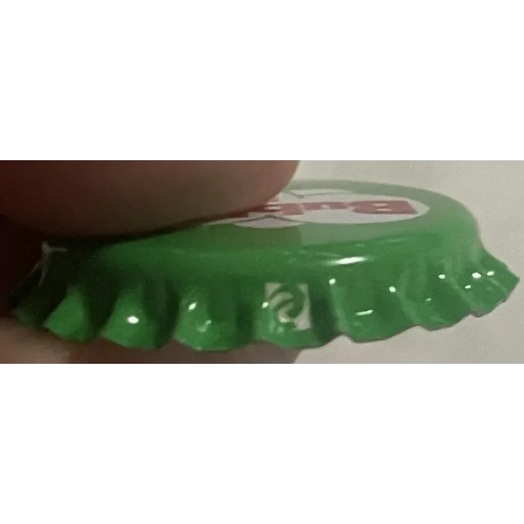 Green bottle cap with crimped edge, adding retro flair to your Vintage Bubble Up collection