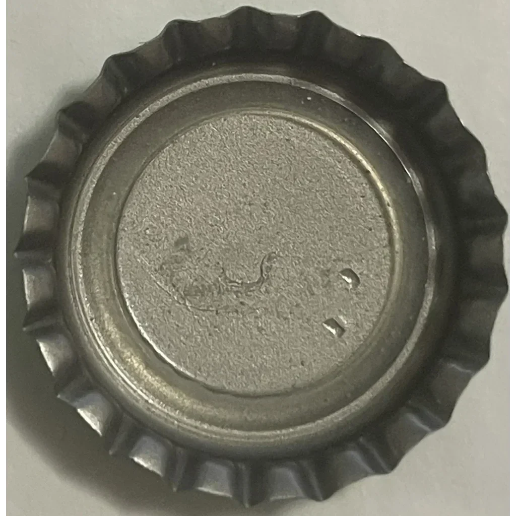 Vintage Bubble Up bottle cap with a ridged edge for some serious 80s nostalgia