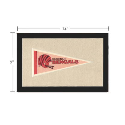 Vintage Cincinnati Bengals pennant in black frame on pink background